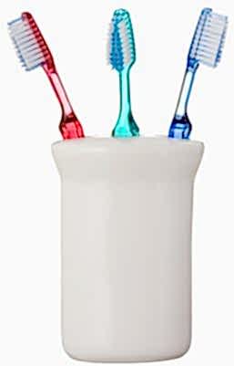 Three Toothbrushes on White Background
