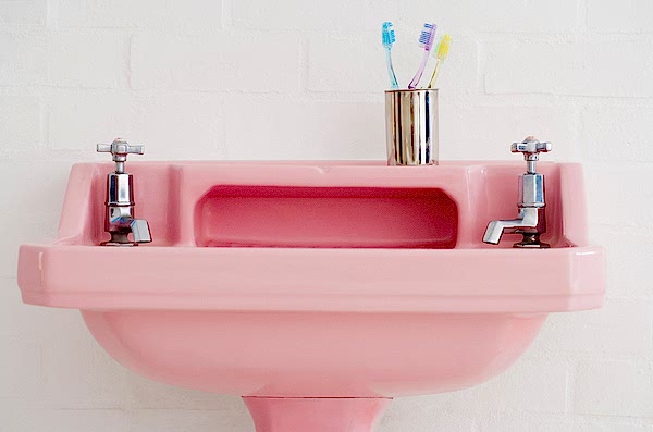 Pink Sink with Toothbrushes