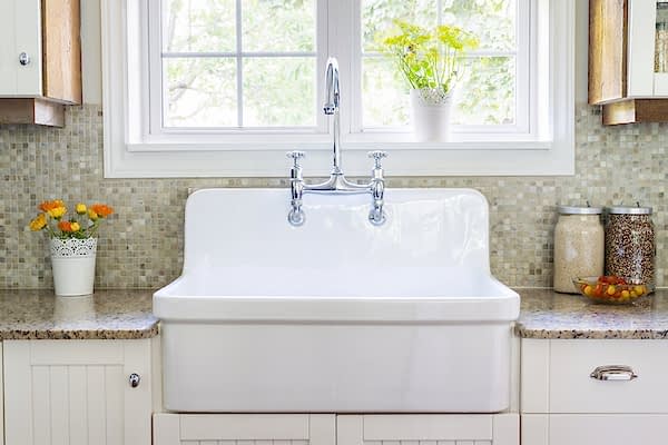 clean-looking kitchen sink in bright room