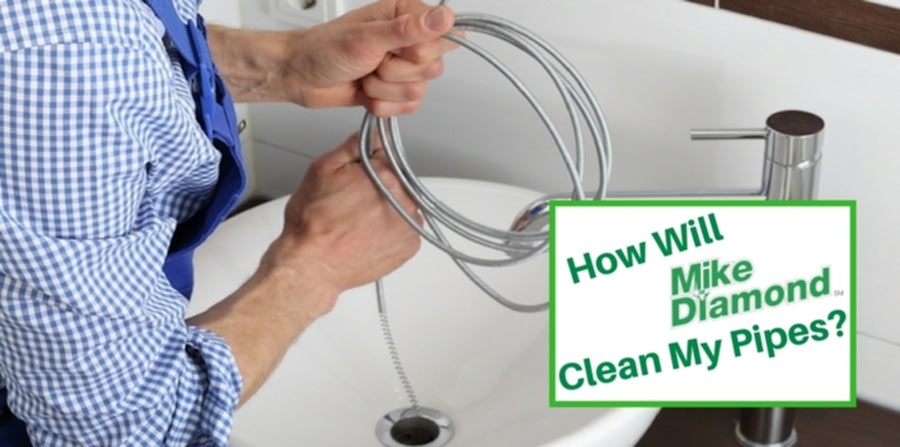 Plumber using snake on pipes. How will Mike Diamond clean my pipes?"