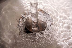 Water running down into drain