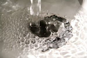water draining out of faucet