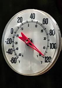 A temperature gauge reads 120 degrees Fahrenheit. 