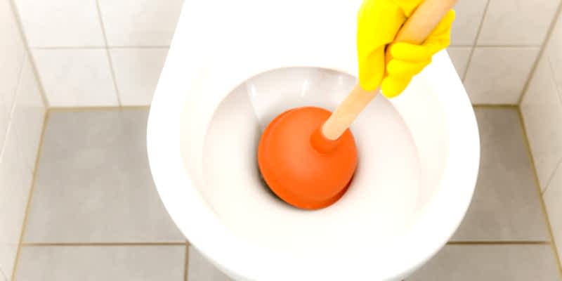 Plunger in a toilet