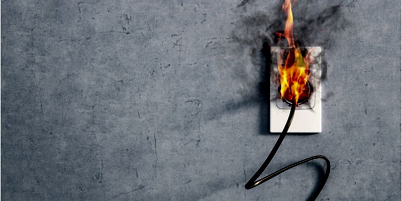 Electrical outlet catching fire after a power surge