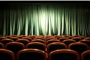 A dark movie theater interior.